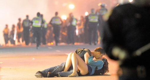 Vancouver Riots 2011 - Couple kissing on ground
