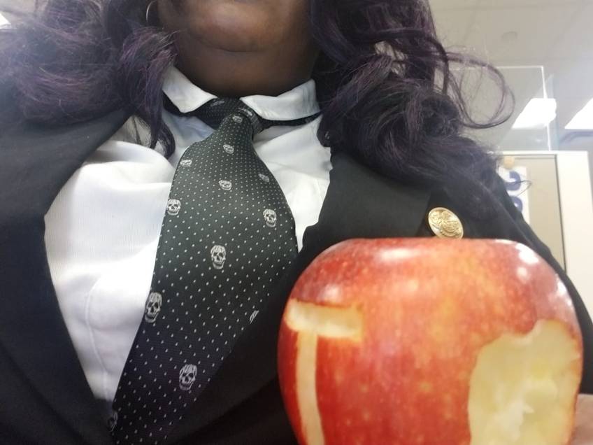 Raivenne semi-cosplaying as Moriarty for Halloween.