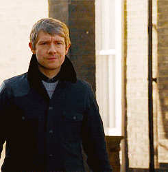 Watson walking down street