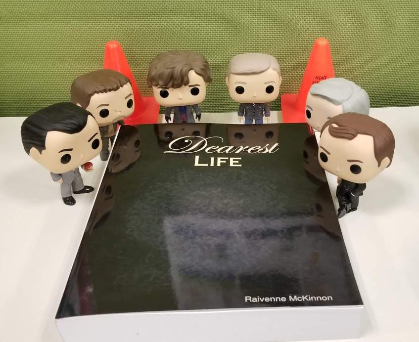 Photo of hardcopy of "Dearest Life" surrounded by the "Boys"