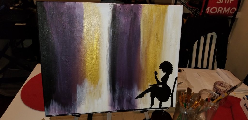 Incomplete art project: black silhouette of a seated woman against an abstract purple, gold and white background