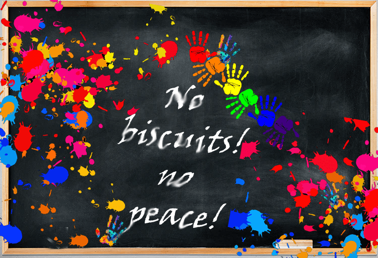 "no biscuits! no peace!" scrawled in a child's handwriting on paint splattered classroom chalkboard with children's hand prints